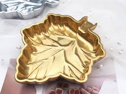 67b9ea7598f8a707689a5b69_small-leaf-ashtray_1748398231545.jpg