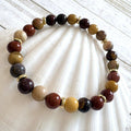 67b9ea7598f8a707689a5b69_8mm-gemstone-jasper-mookaite_1789427817277.jpg