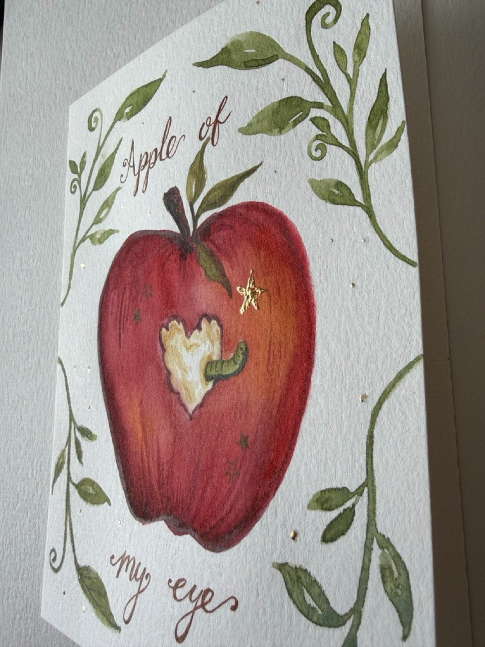 67b9ea7598f8a707689a5b69_apple-of-my-eye-side-1-large_1778718685181.jpeg