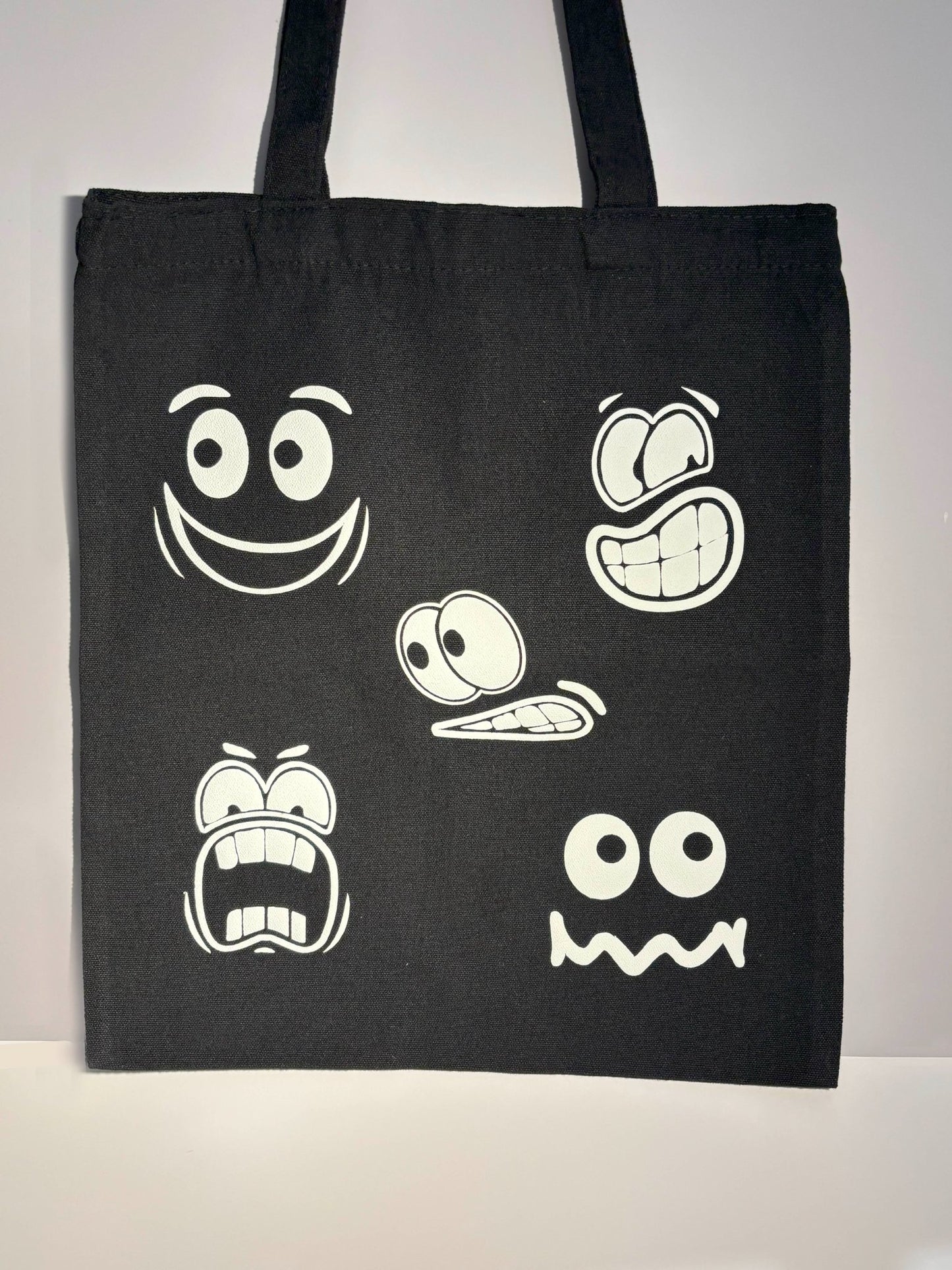 67b9ea7598f8a707689a5b69_black-tote-bag_1754440239748.jpg