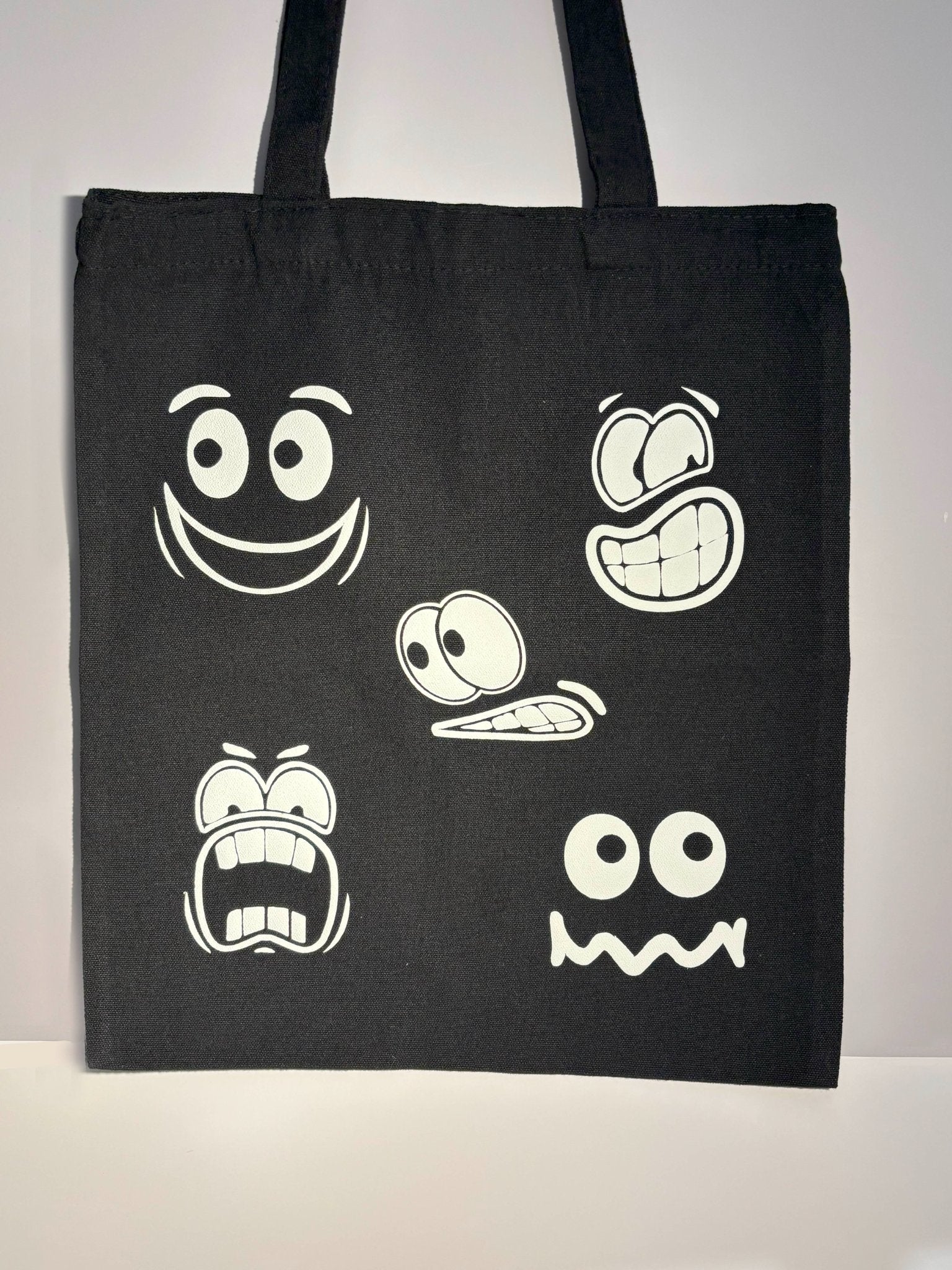 67b9ea7598f8a707689a5b69_black-tote-bag_1754440239748.jpg