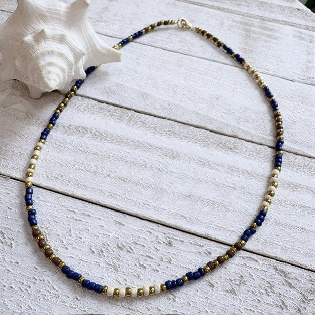 67b9ea7598f8a707689a5b69_blue-and-white-seed-bead_1789417373390.jpg