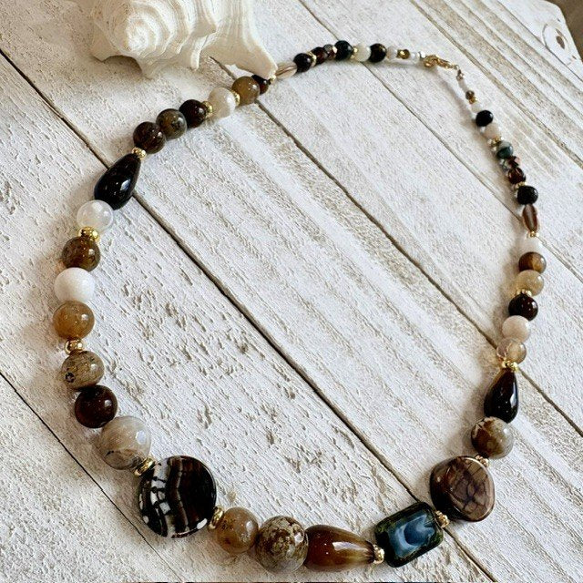 67b9ea7598f8a707689a5b69_brown-gemstone-and-14k-gold-full_1789419544269.jpg