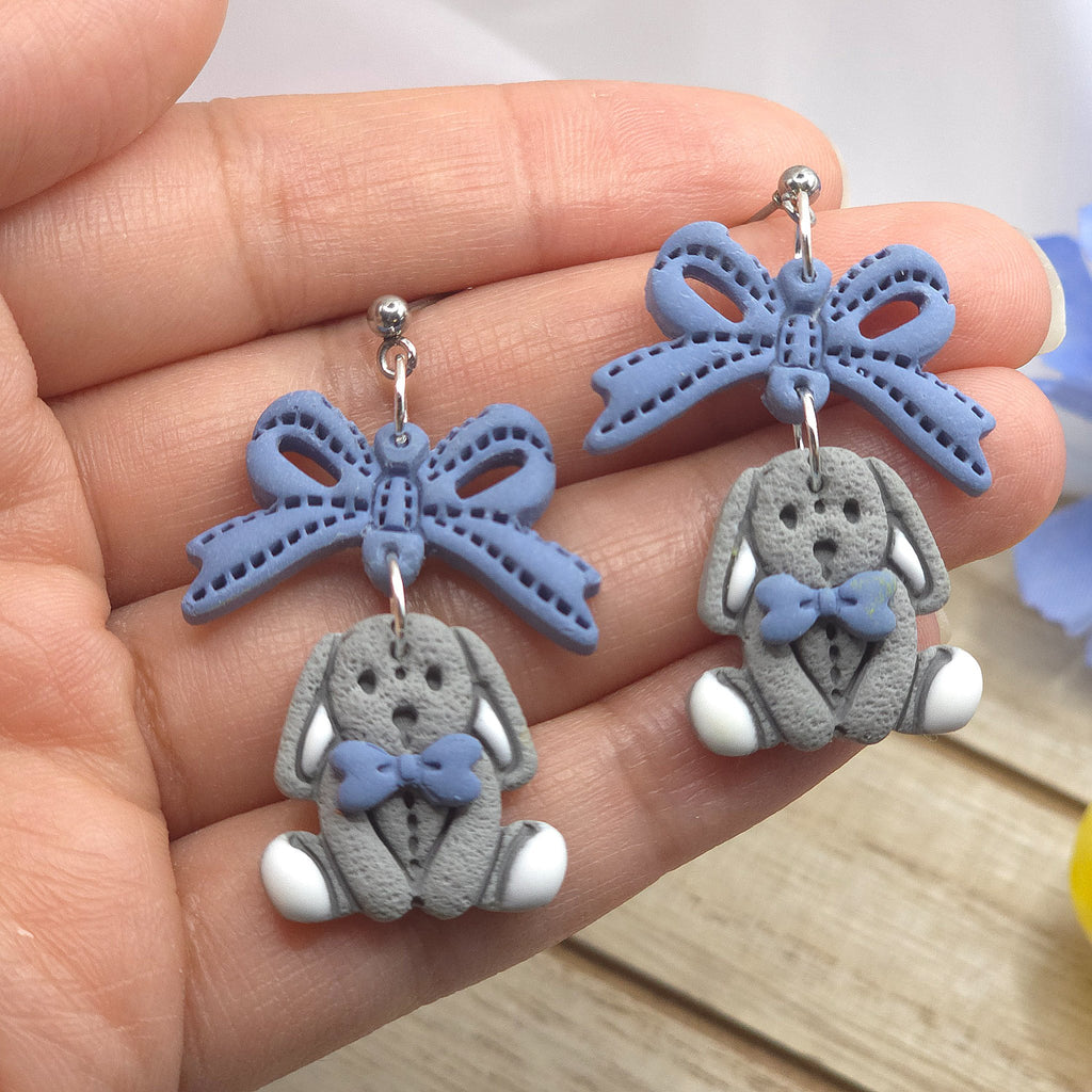 67b9ea7598f8a707689a5b69_bunnyandbowdangleearring9_1778731446051.jpg