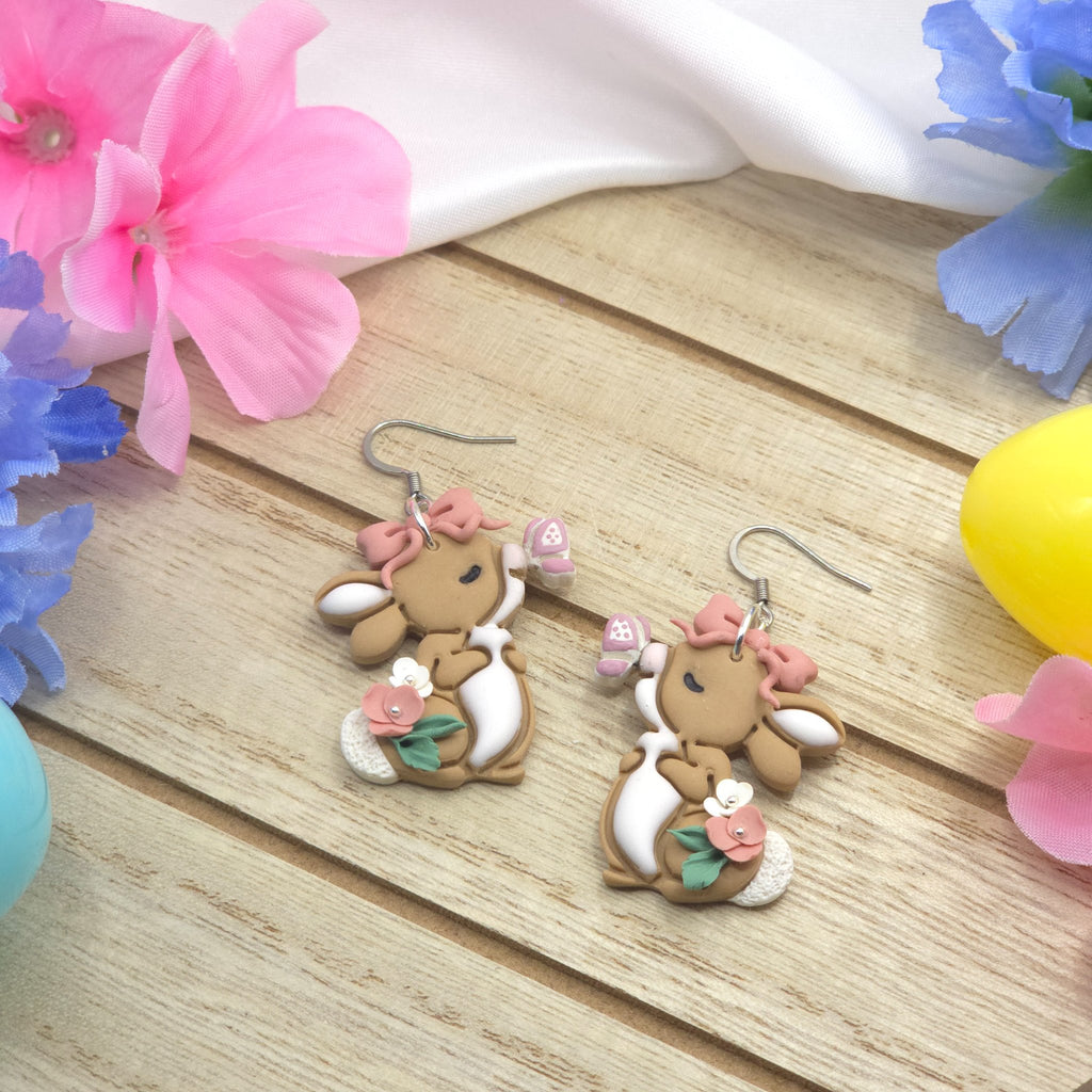67b9ea7598f8a707689a5b69_bunnyandbutterflydropearring1_1778732212900.jpg