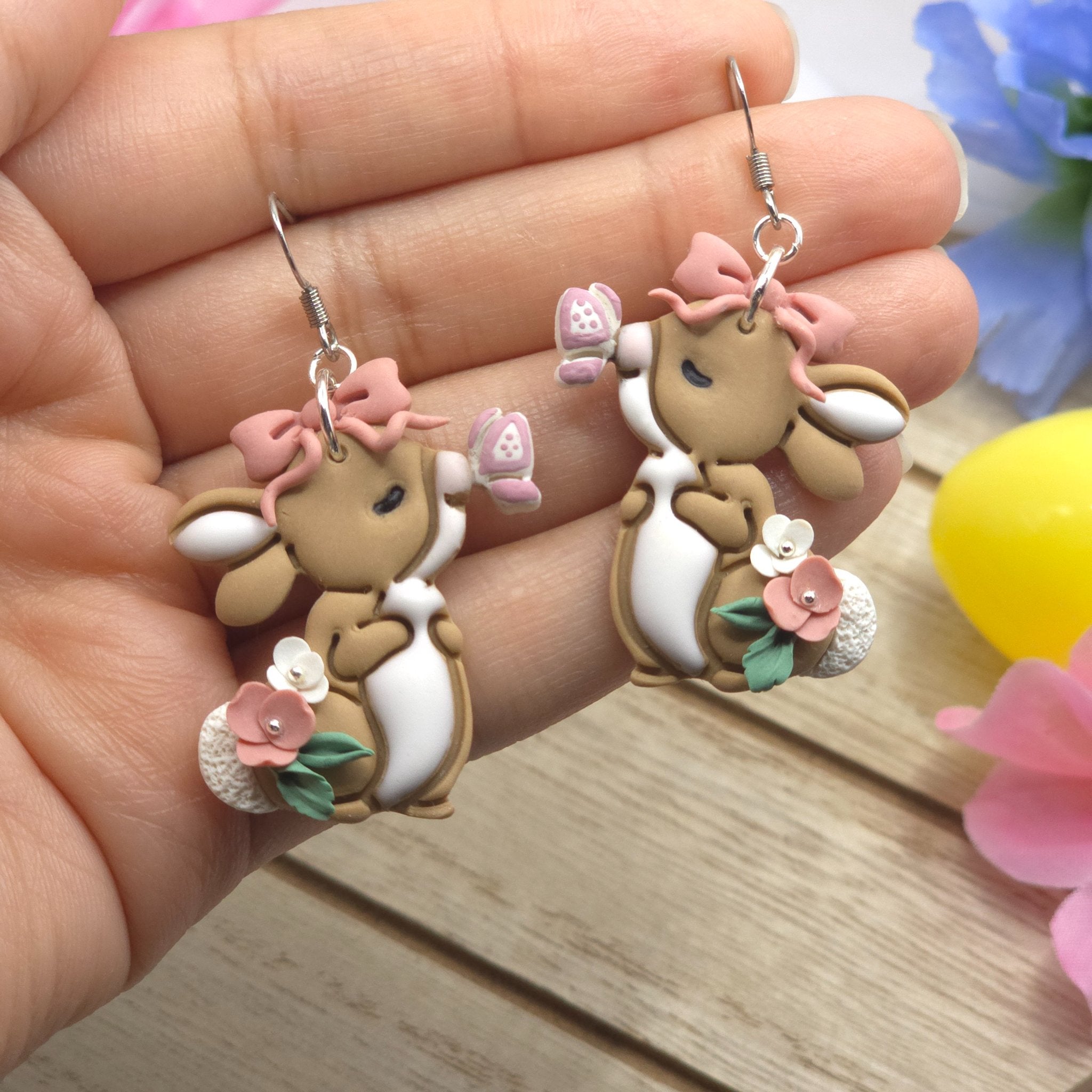 67b9ea7598f8a707689a5b69_bunnyandbutterflydropearring4_1778732212900.jpg