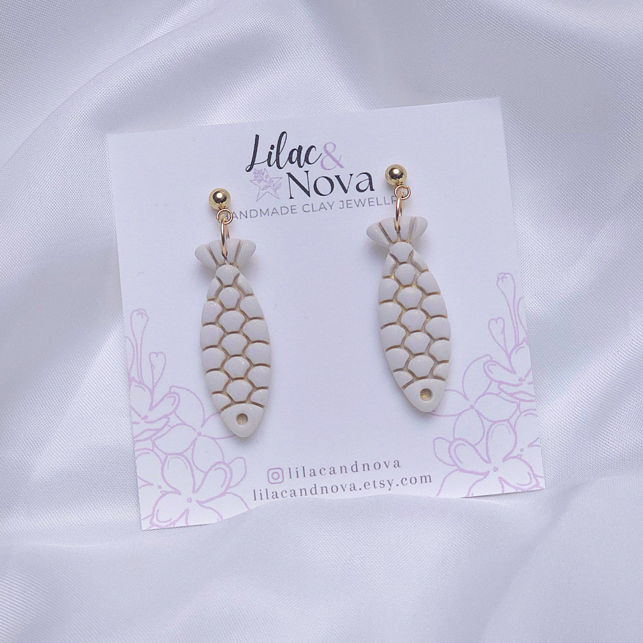 67b9ea7598f8a707689a5b69_fishgoldaccentdropearring_1779067354942.jpg