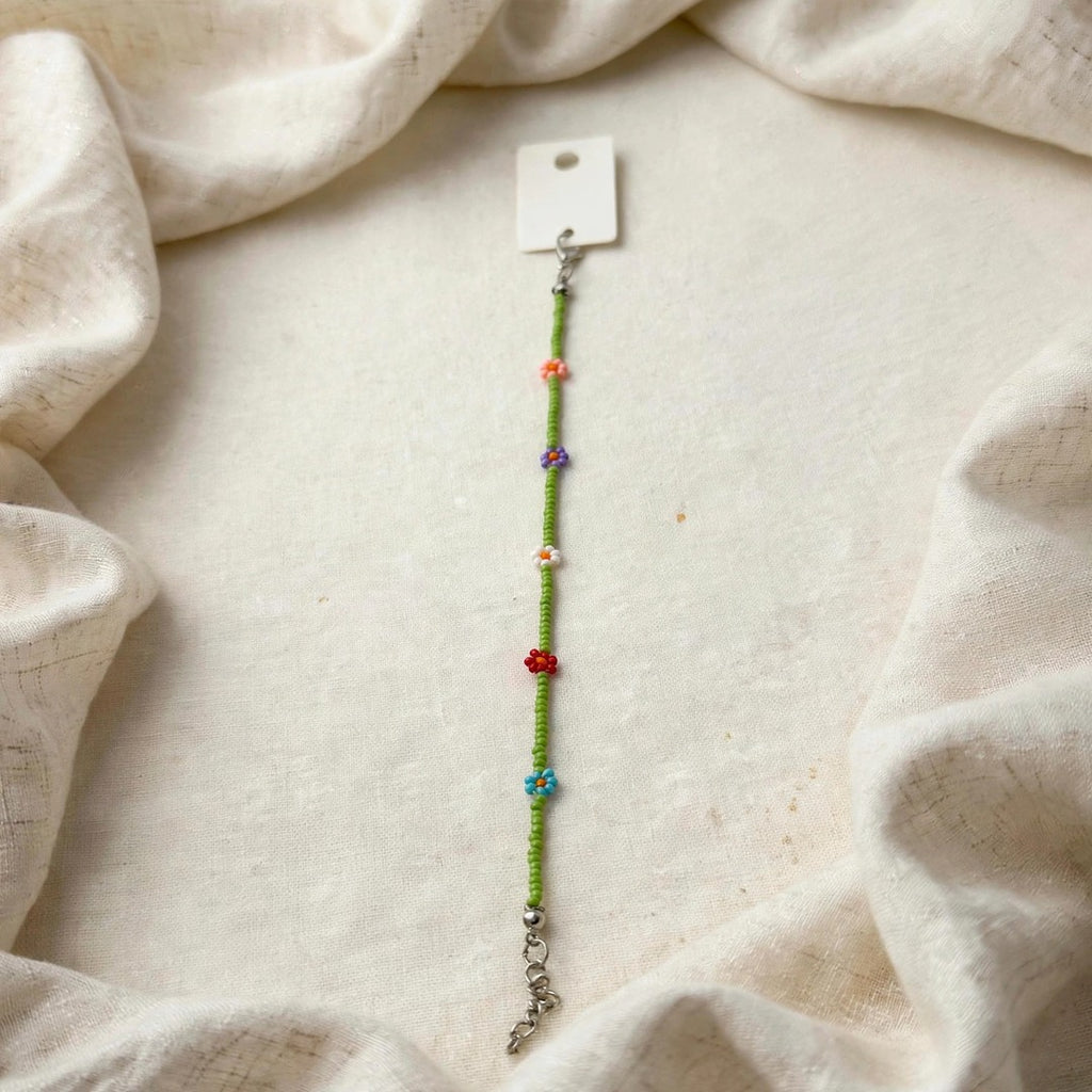 67b9ea7598f8a707689a5b69_green-beaded-bracelet-1080_1789261931327.jpeg