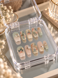 67b9ea7598f8a707689a5b69_green-floral-crystal-press-on-nails_1793120252154.png