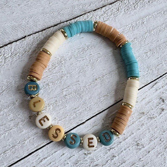67b9ea7598f8a707689a5b69_heishi-turquoise-and-yellow_1789428307319.jpg