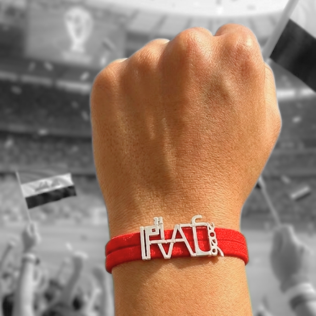 67b9ea7598f8a707689a5b69_iraq-world-cup-2026-red-on-hand-stadium_1777992910610.png