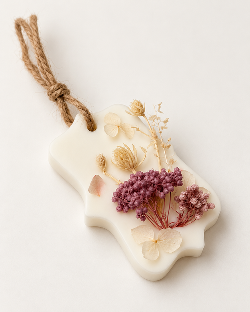 67b9ea7598f8a707689a5b69_ivory-wax-floral-ornament-with-jute-twine_1792676836265.png