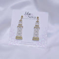 67b9ea7598f8a707689a5b69_lighthousegoldaccentdropearring_1779066953868.jpg