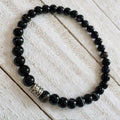 67b9ea7598f8a707689a5b69_men-s-bracelet-6mm-black_1789441407586.jpg