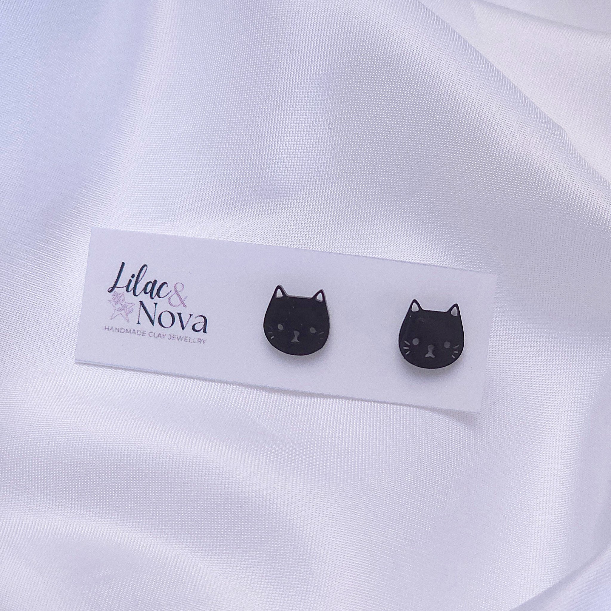 67b9ea7598f8a707689a5b69_metalfacecatstud-black_1777780279508.jpg