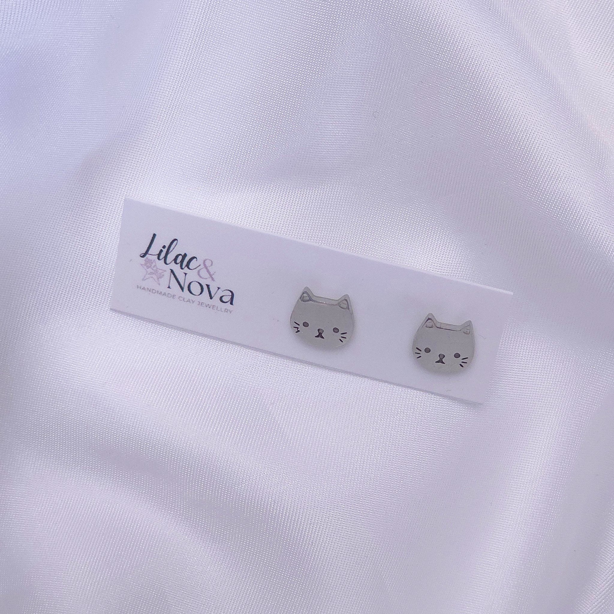 67b9ea7598f8a707689a5b69_metalfacecatstud-silver_1777780298562.jpg