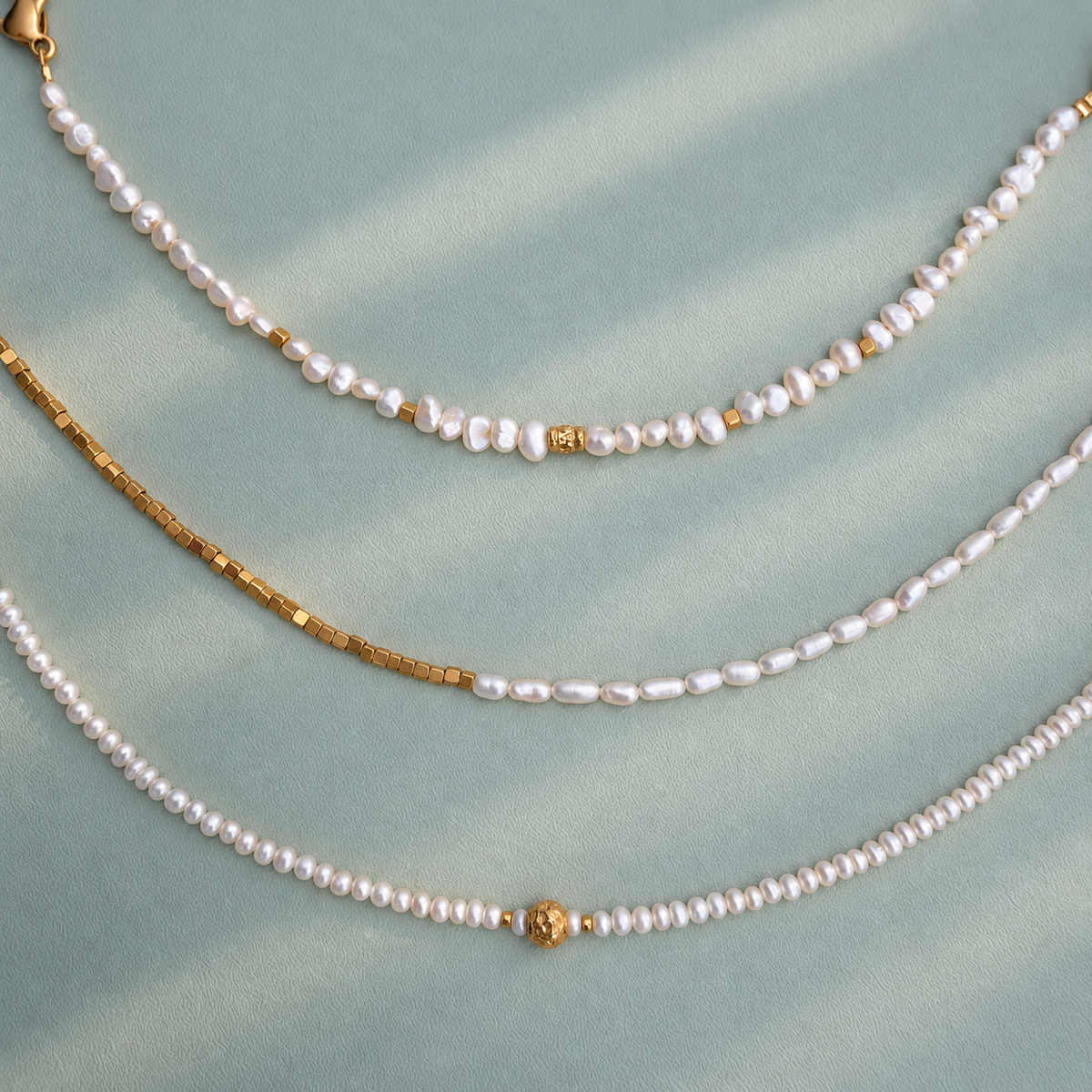 67b9ea7598f8a707689a5b69_minimal-tiny-pearl-bracelets_1790786762179.png