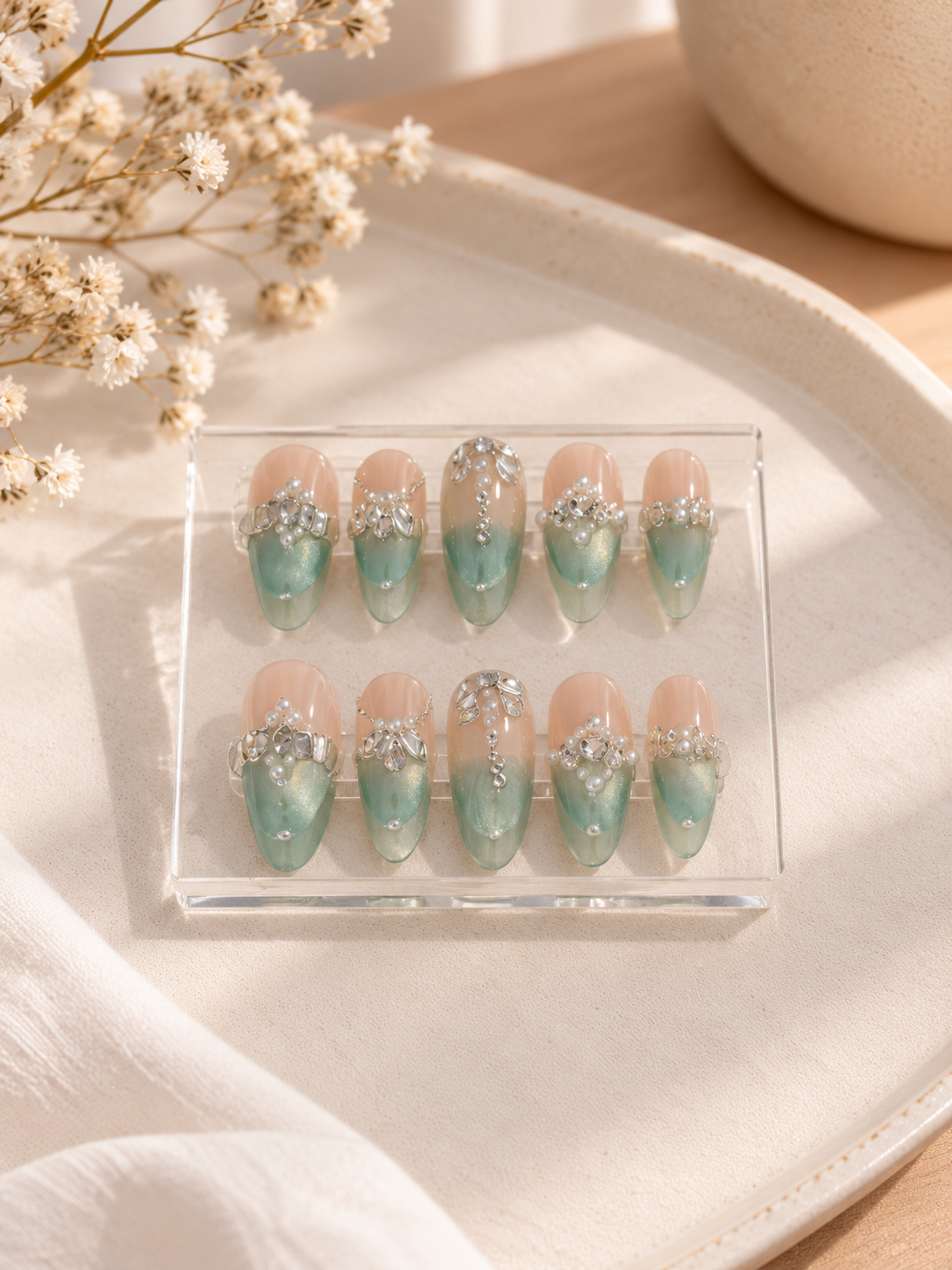 67b9ea7598f8a707689a5b69_mint-ombre-rhinestone-nail-display_1793116699337.png