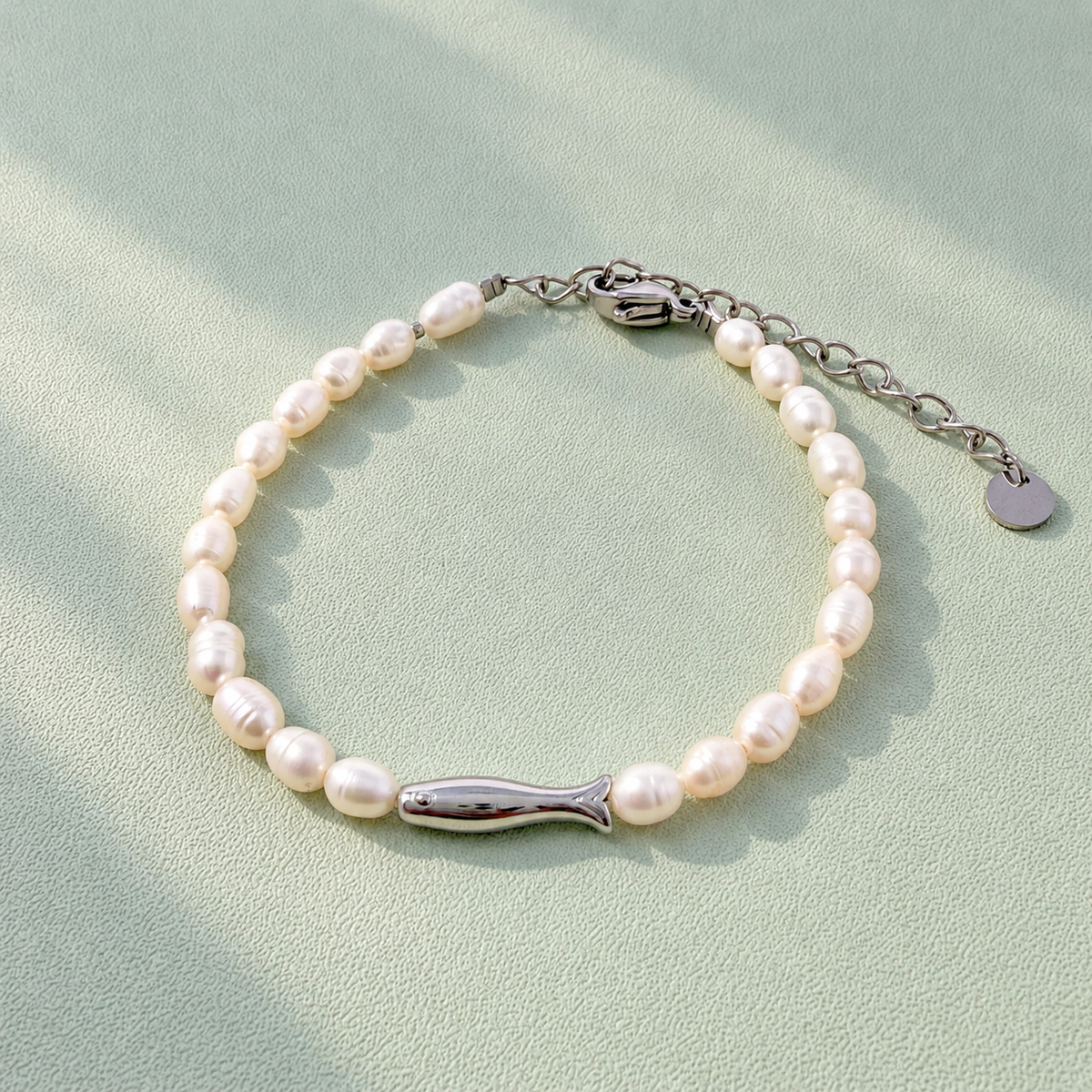 67b9ea7598f8a707689a5b69_natural-pearl-bracelets-3-4mm-pearls-4_1790788270504.png