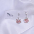 67b9ea7598f8a707689a5b69_resinfloralcatdropearring_1777783901546.jpg