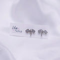 67b9ea7598f8a707689a5b69_rhinestonedragonsilverstudearring_1778730811374.jpg