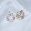 67b9ea7598f8a707689a5b69_roundshellandsanddollargemaccentdropearring_1779290415558.jpg