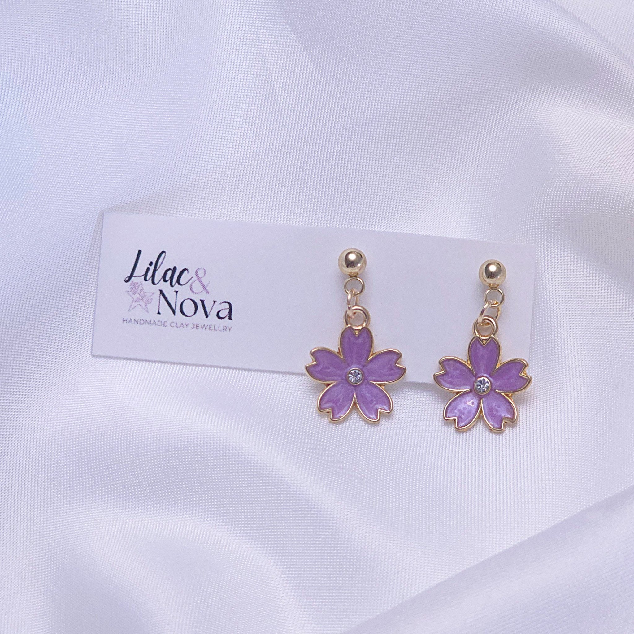 67b9ea7598f8a707689a5b69_sakurawgold-purple_1777781383674.jpg