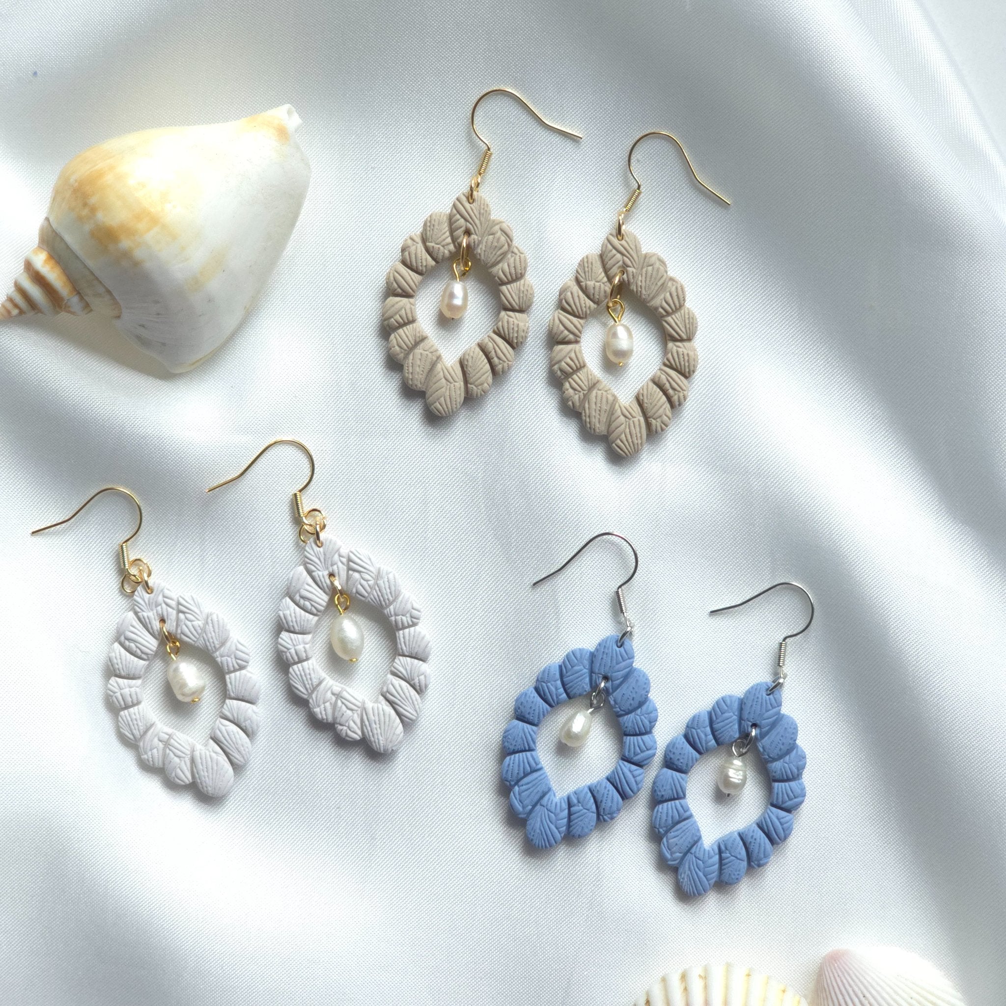 67b9ea7598f8a707689a5b69_scallopshelldangleearring-3_1749223201874.jpg