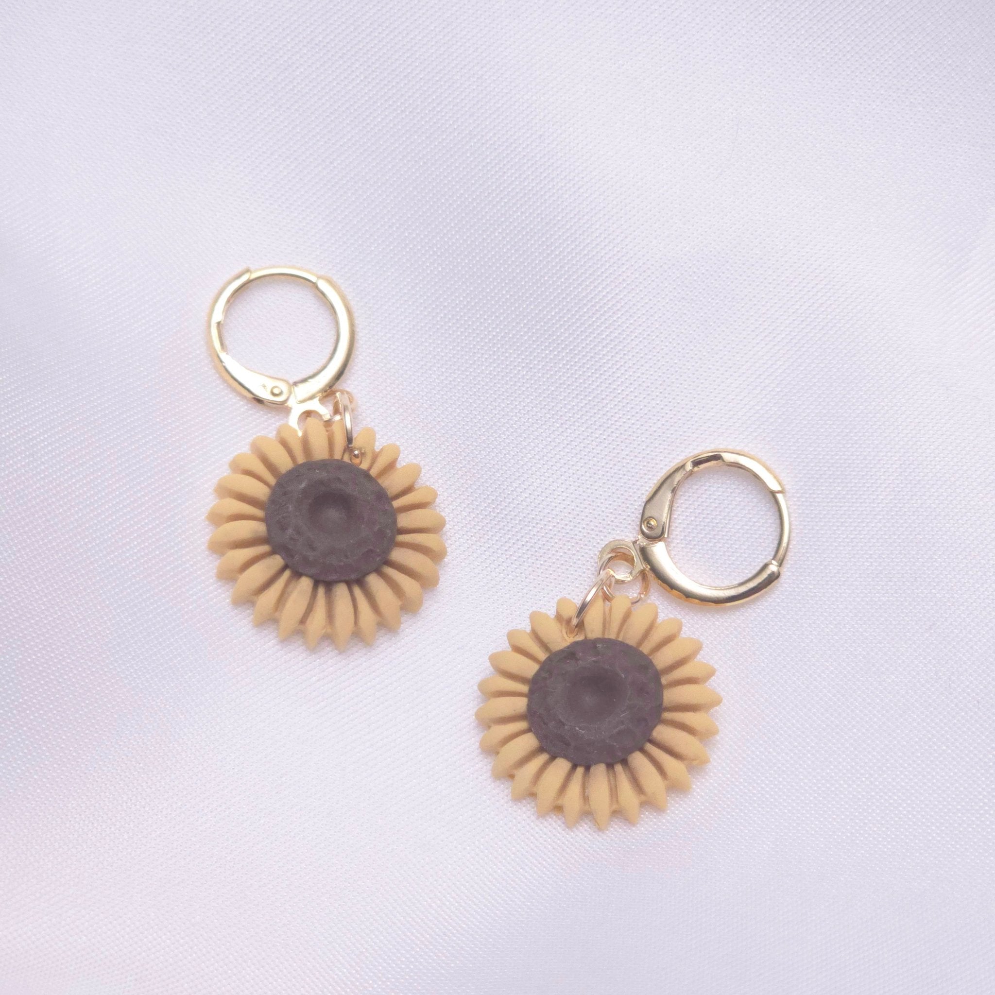 67b9ea7598f8a707689a5b69_sunflowerhuggiedropearring_1779339583124.jpg