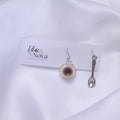 67b9ea7598f8a707689a5b69_teacupandspoonsetdropearring_1777783618559.jpg