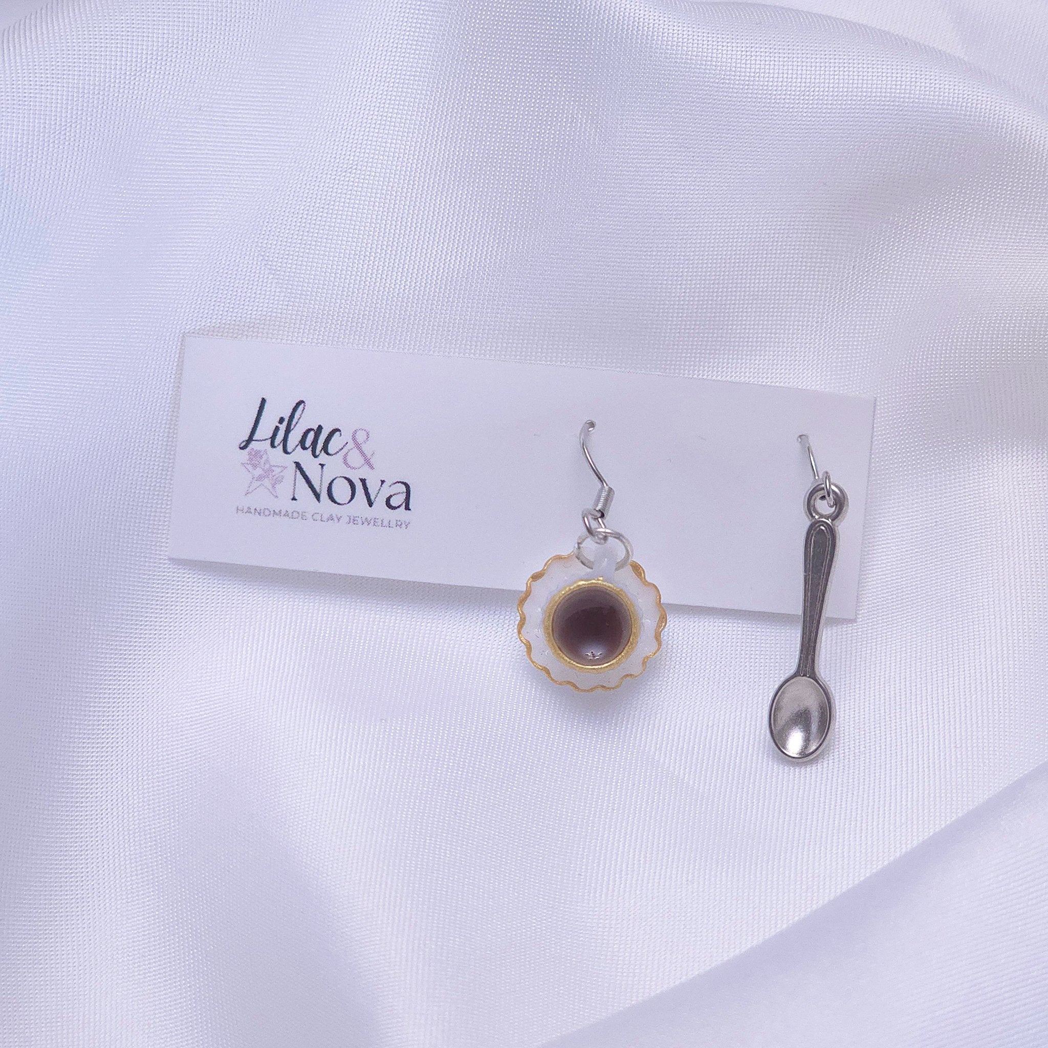 67b9ea7598f8a707689a5b69_teacupandspoonsetdropearring_1777783618559.jpg