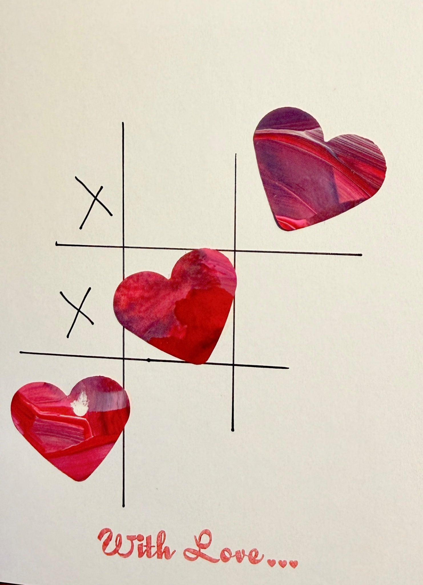67b9ea7598f8a707689a5b69_tictactoe3heartswithlove_1768400104869.jpg